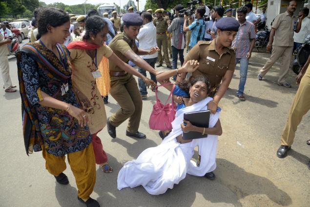 Police assaulting protesting transgenders in Tamil Nadu (Pic by S.R. Raghunathan via The Hindu)