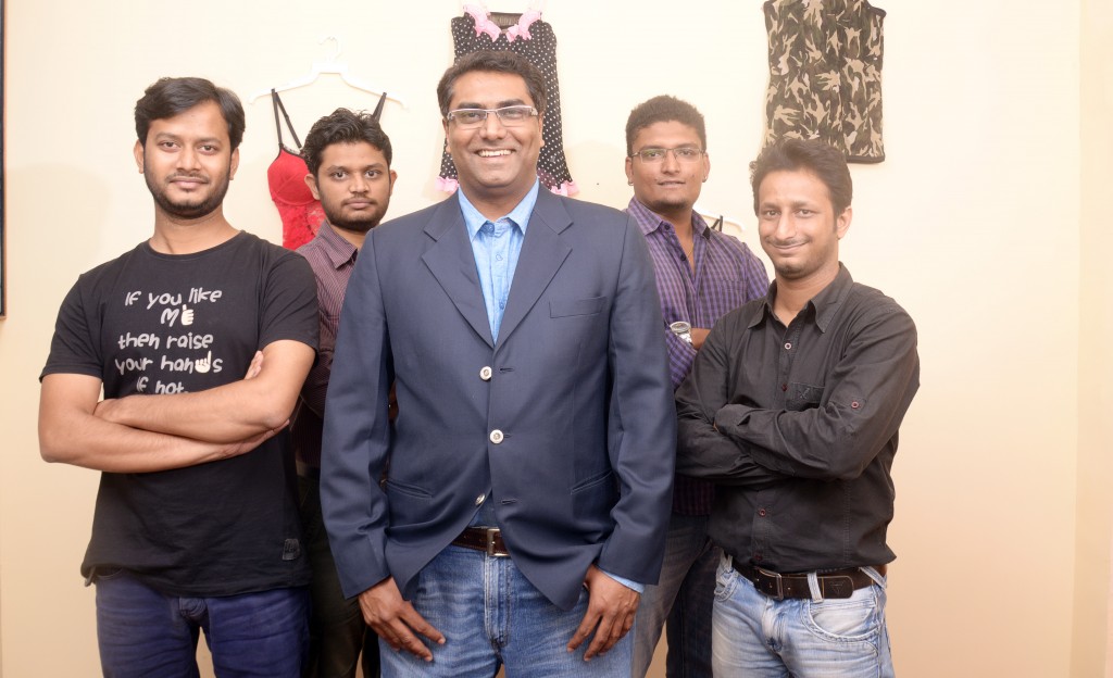 Samir Saraiya, CEO of That's Personal (center) with the team