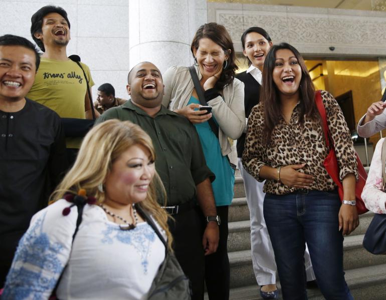 Transgender rights activists celebrate the ruling outside the court in Putrajaya. Picture: Reuters